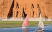 Beautiful Nile scenery with sailboat in the Nile on the way to The Front of the Abu Simbel Temple - Egypt, Africa