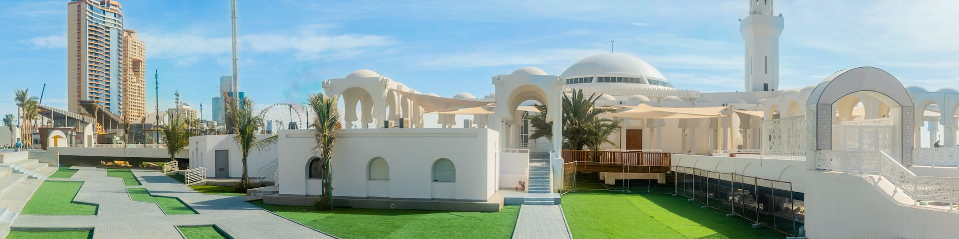 Alrahmah white mosque with city promenade in the background, Jeddah, Saudi Arabia