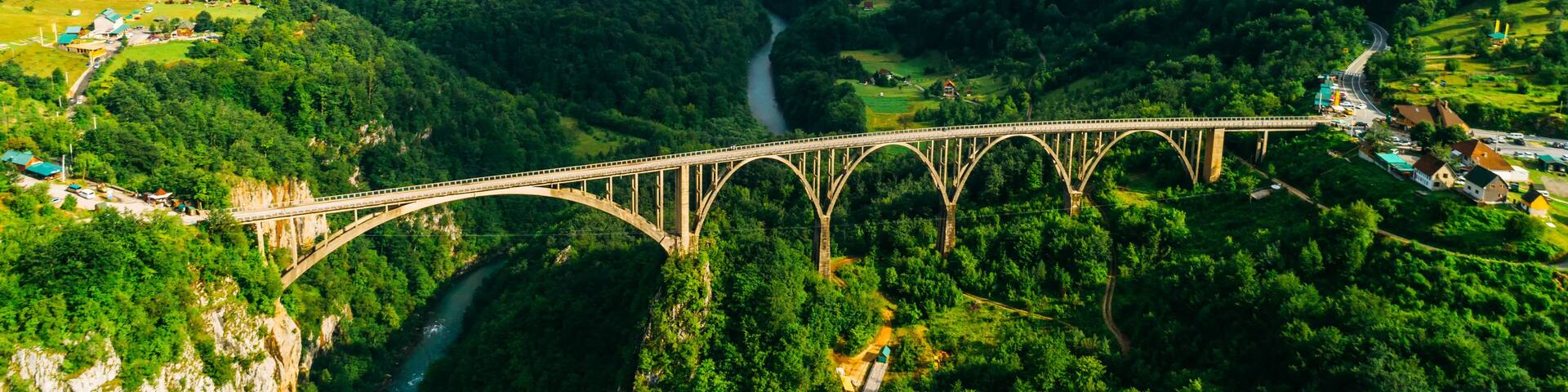 Aerial View of Durdevica Tara Arc Bridge in the Mountains, One of the Highest Automobile Bridges in Europe.