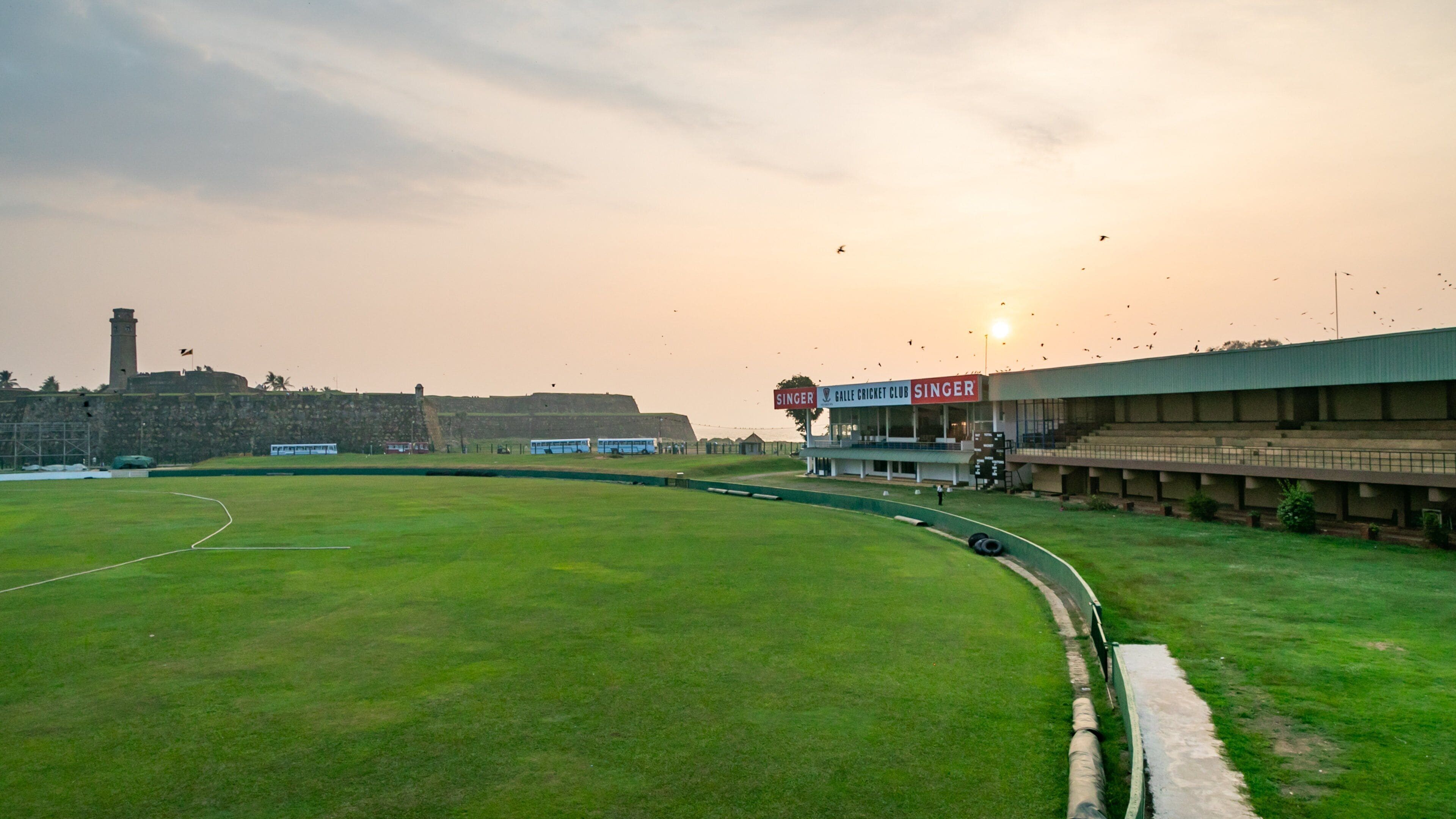 Galle International Cricket Stadium showing a sunset
