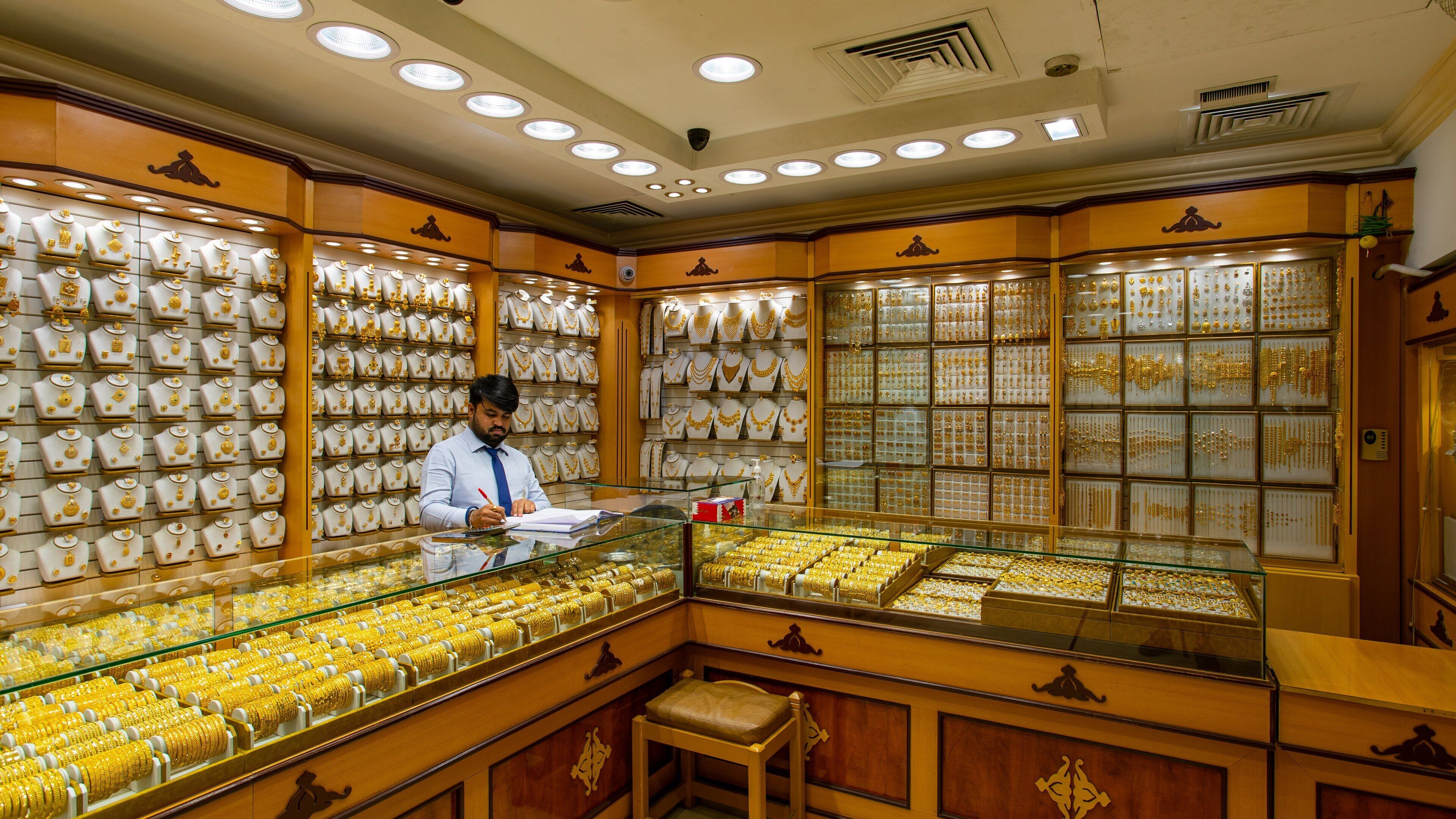 Gold Souq showing shopping and interior views as well as an individual male