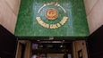 A storefront with a green tiled facade and the sign "BAIRIN GOLD SOON".