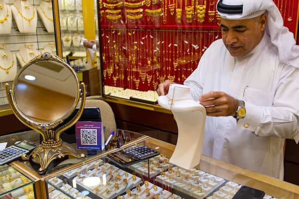 Gold Souq showing shopping and interior views as well as an individual male