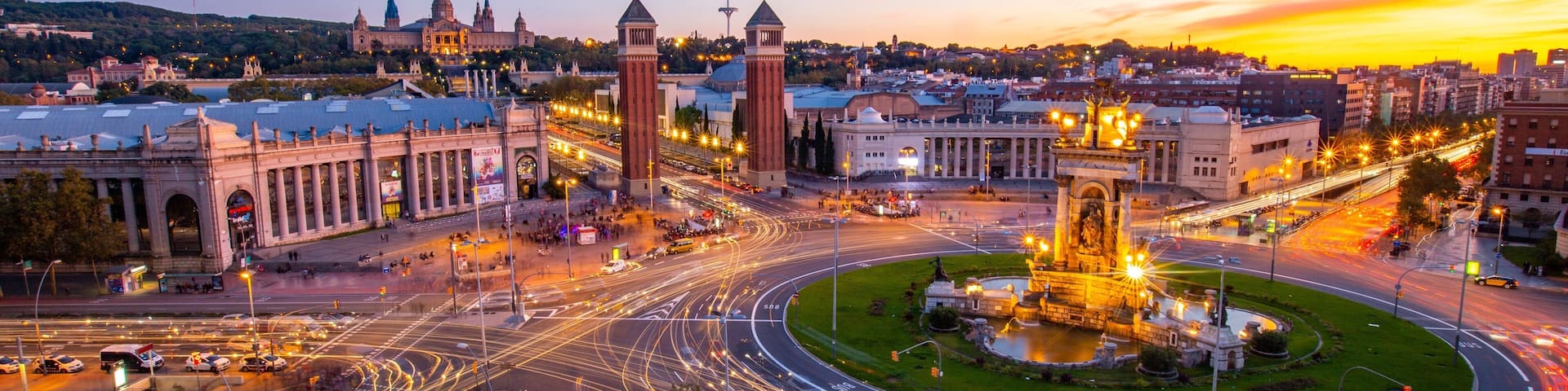Arenas de Barcelona featuring a monument, night scenes and a sunset
