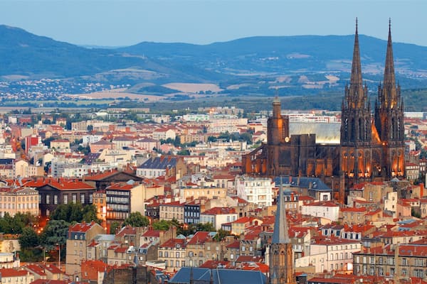 Montjuzet Park showing a church or cathedral, a city and heritage architecture