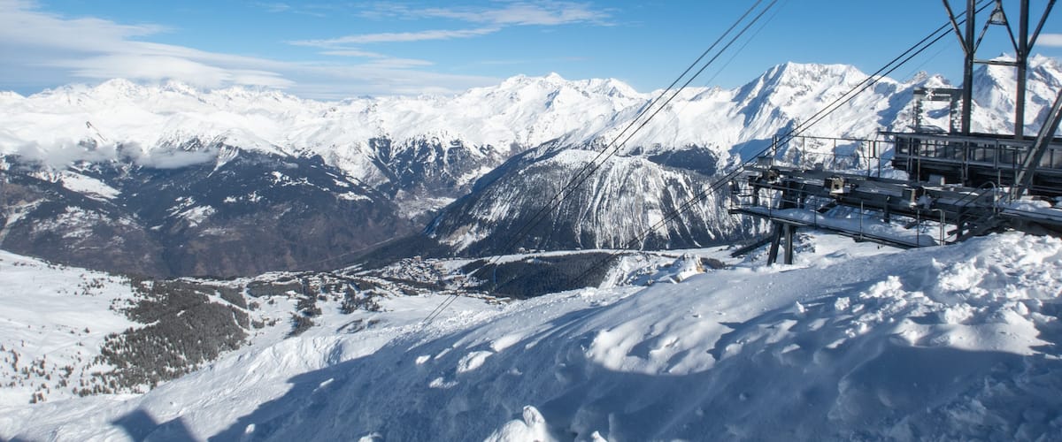 At the top of the Saulire Express ski lift above Meribel and Courchevel in the French Alps in winter