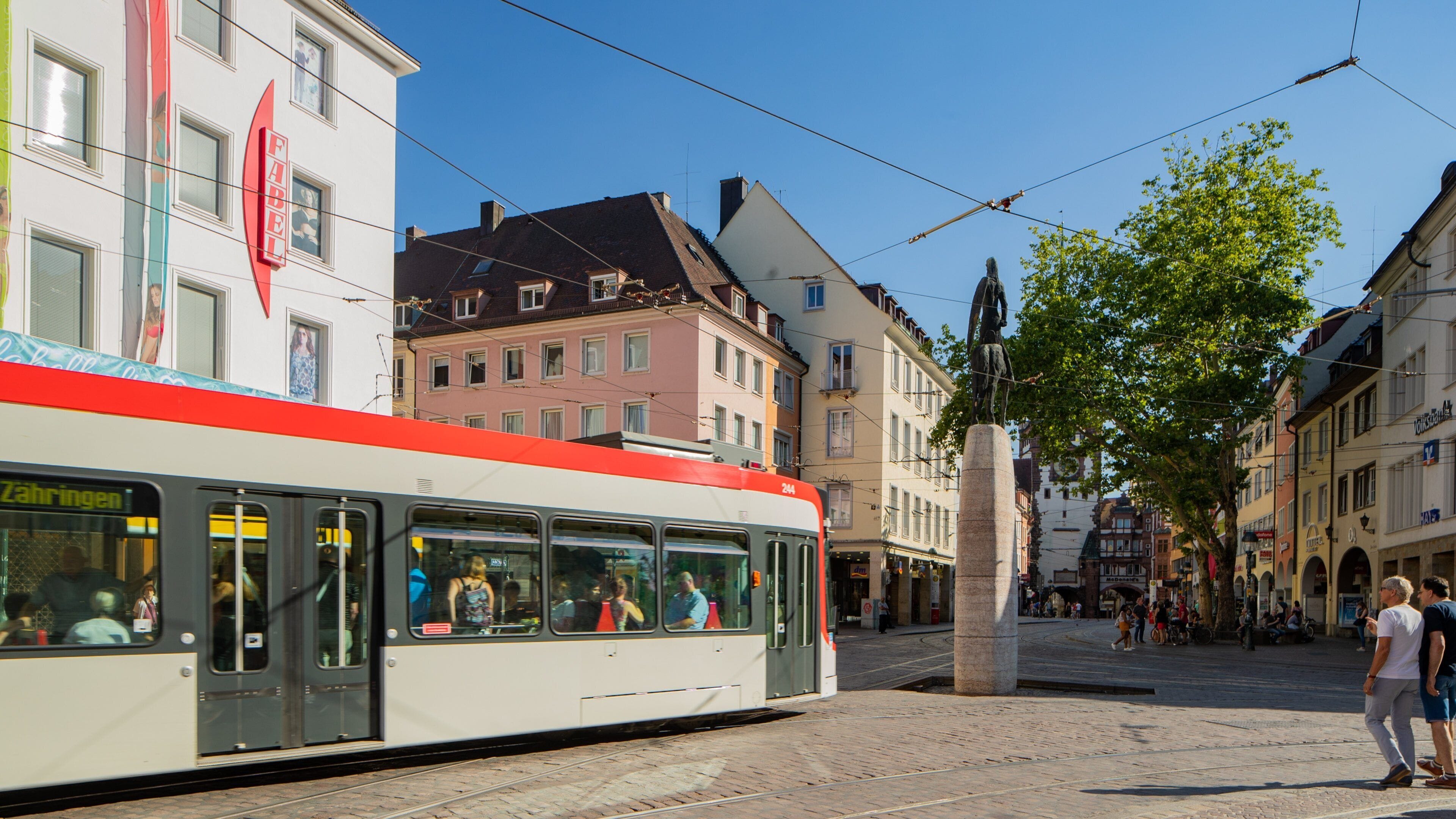Bertoldsbrunnen which includes a city and a square or plaza