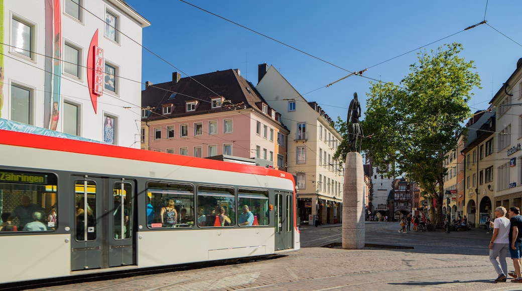 Bertoldsbrunnen which includes a city and a square or plaza