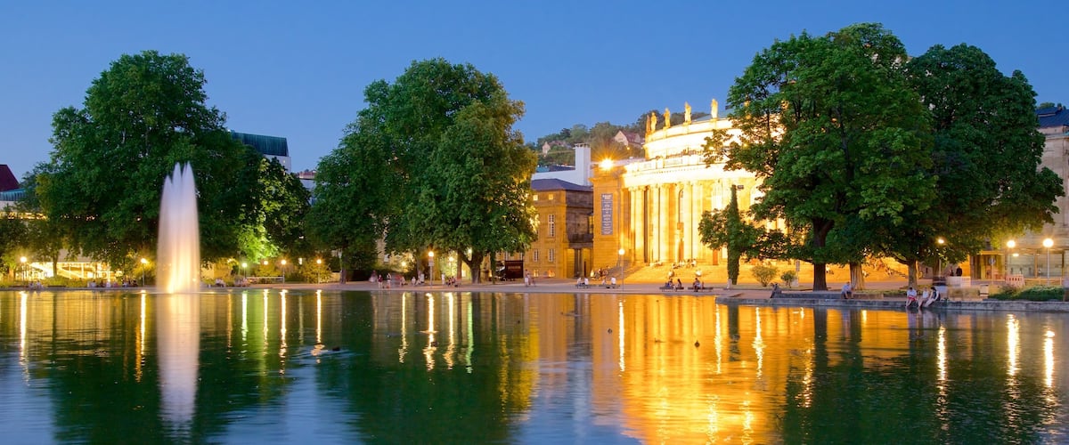 Opera which includes a park, a fountain and a lake or waterhole