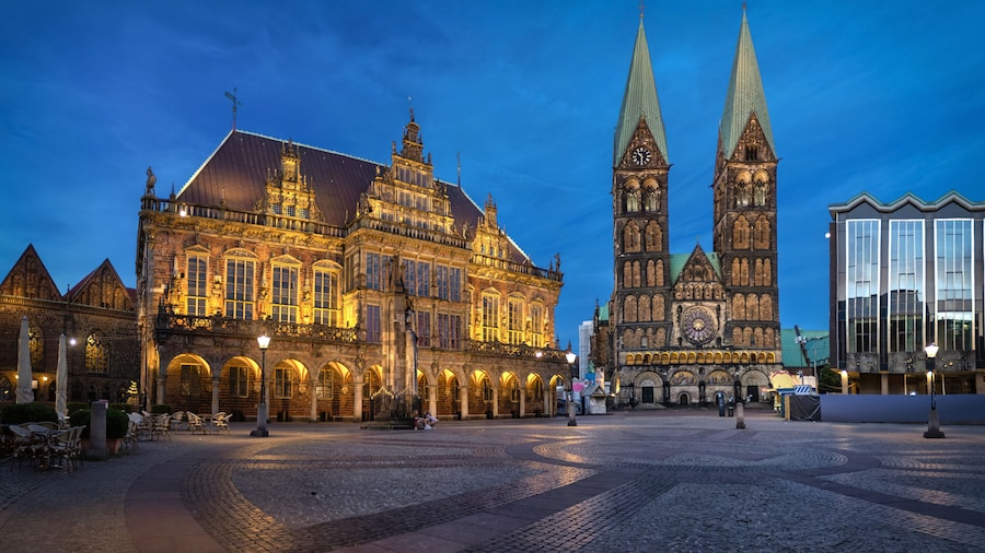 Bremen, Germany. Panorama of Market square at dusk with historic building of Town Hall and St Peter's Cathedral