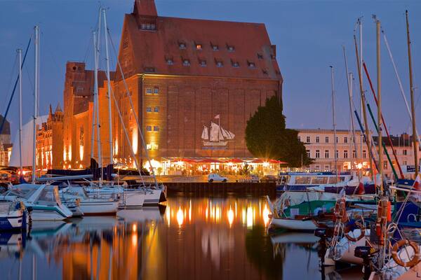 Stralsund Harbour showing night scenes, a city and a bay or harbour