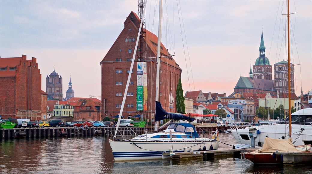 Stralsund Harbour showing a sunset and a bay or harbour
