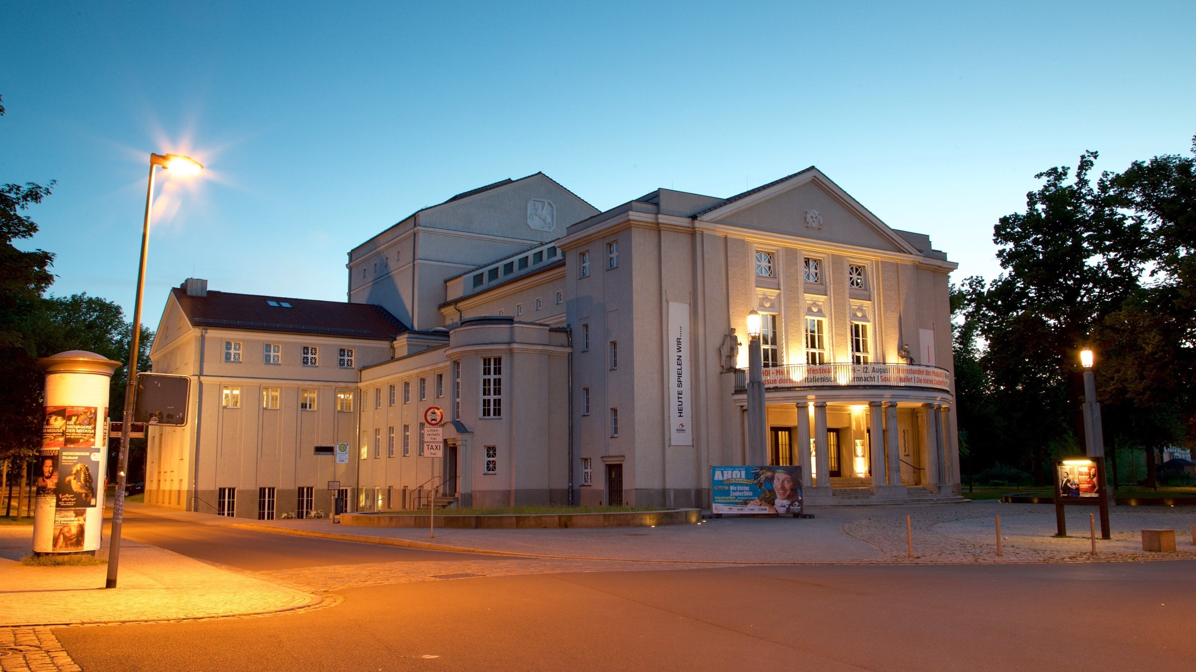 Theatre Vorpommern in Stralsund showing heritage architecture and night scenes