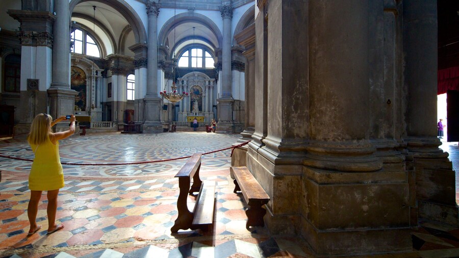Parrocchia Santa Maria Della Salute featuring heritage architecture and interior views