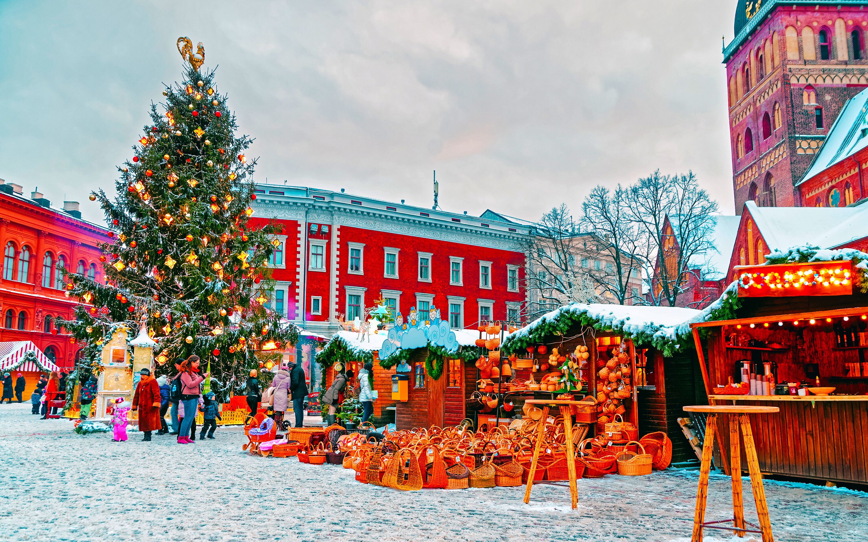 European Christmas market in winter Riga in Latvia. Winter. Late at evening. Street and holiday fair in European city Advent Decoration with Crafts Items on Bazaar