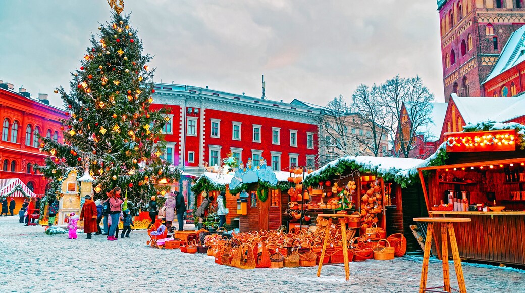 European Christmas market in winter Riga in Latvia. Winter. Late at evening. Street and holiday fair in European city Advent Decoration with Crafts Items on Bazaar