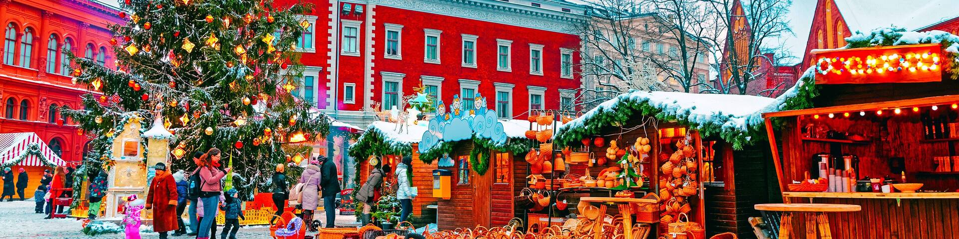 European Christmas market in winter Riga in Latvia. Winter. Late at evening. Street and holiday fair in European city Advent Decoration with Crafts Items on Bazaar
