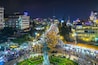 Da Lat, Vietnam - May 12th, 2017: Da Lat Market night skyline night view with lights attracts thousands of people walking along the road shopping crowded bustle of city tourism in Da Lat, Vietnam