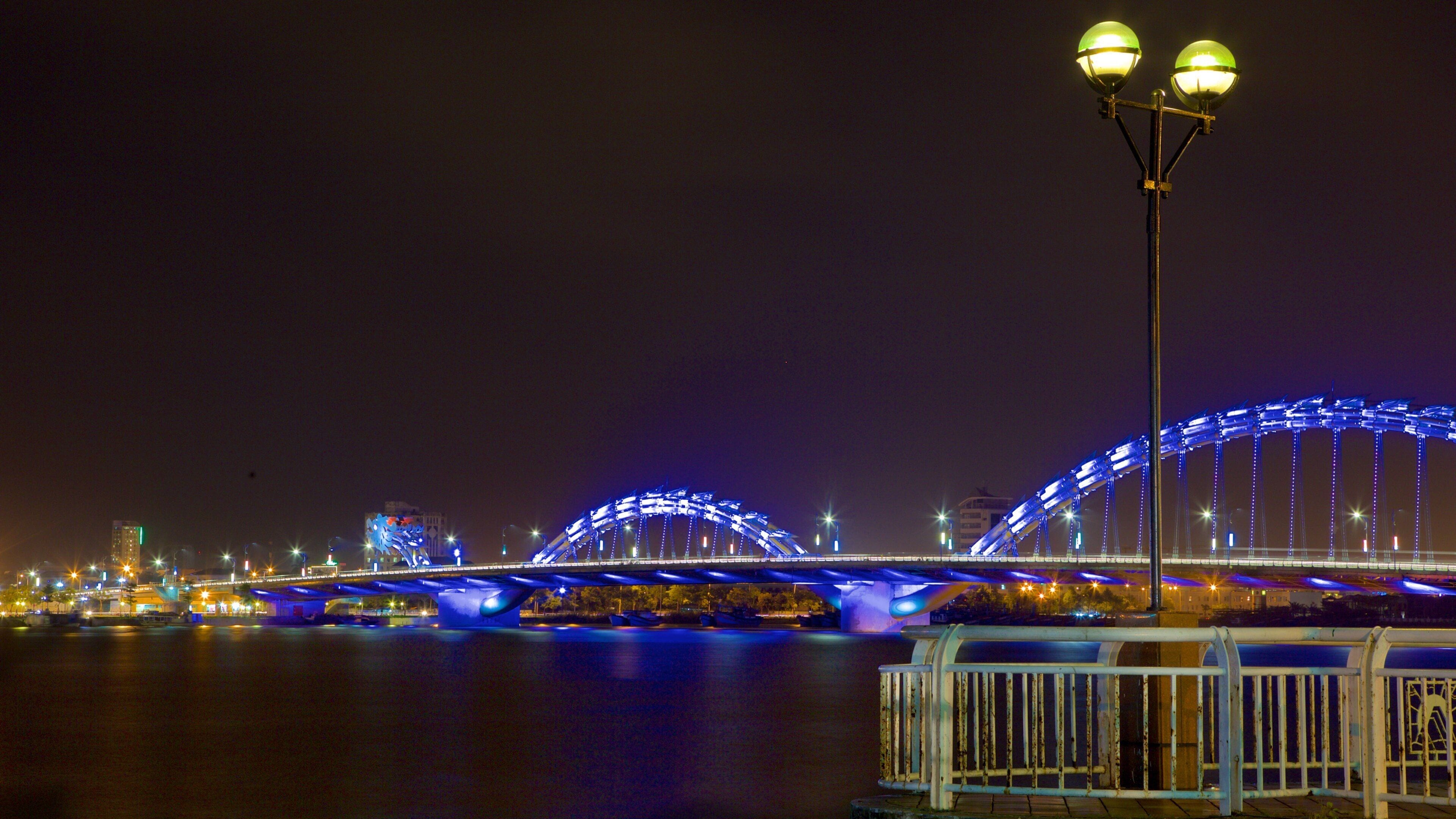 Da Nang showing modern architecture, night scenes and a bridge