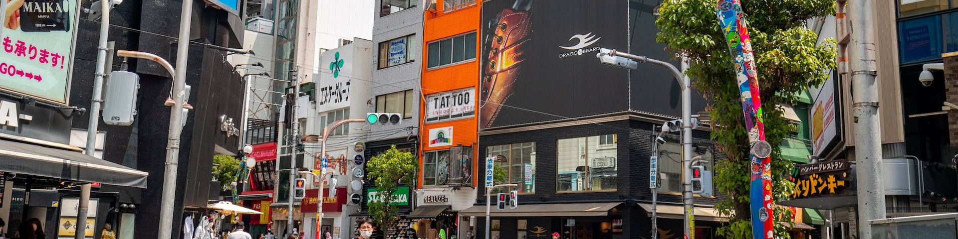 America Village featuring a city and street scenes as well as a couple