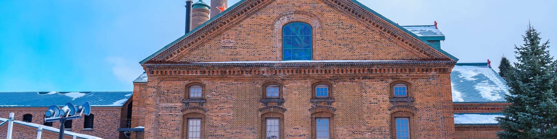 Sapporo Beer Museum with Snow in winter season. landmark and popular for attractions in Hokkaido, Japan. Travel and Vacation concept
