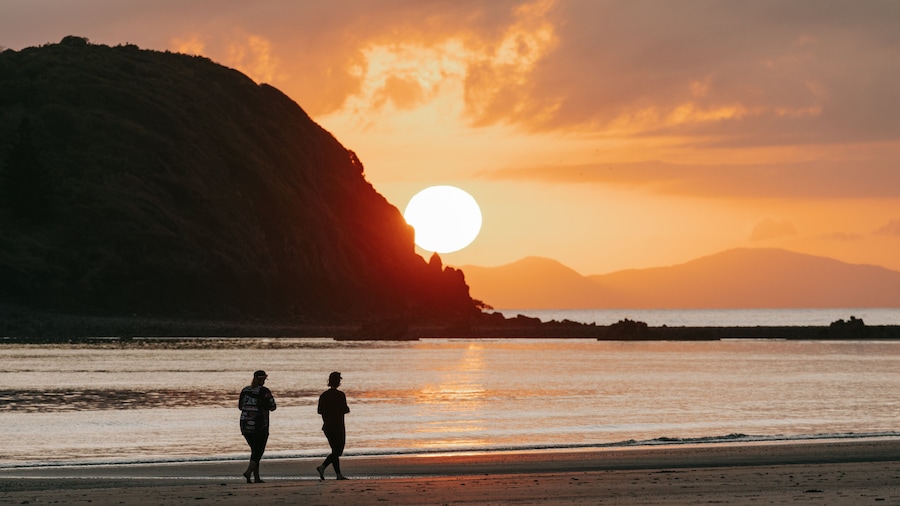Cape Hillsborough National Park featuring a sunset and general coastal views as well as a couple