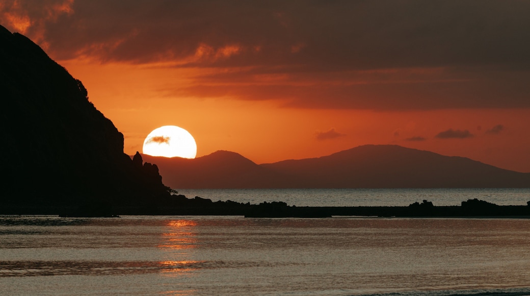 Cape Hillsborough National Park featuring general coastal views, a sunset and rocky coastline