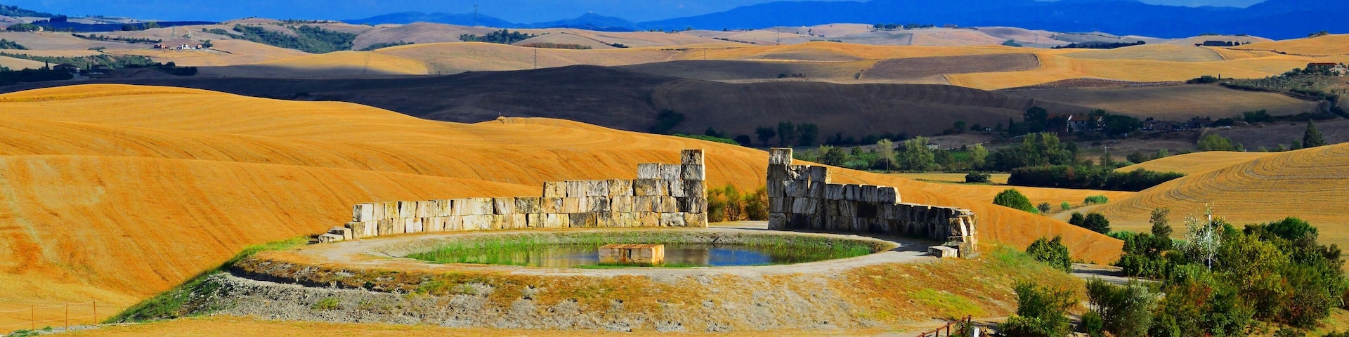 Tuscan landscape near the town of Lajatico, in the province of Pisa, Italy with the Teatro del Silenzio in the background