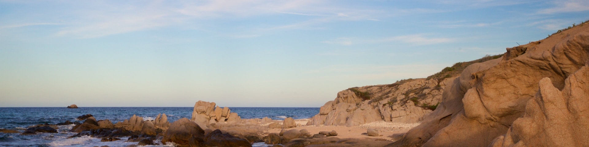Los Arbolitos Beach featuring a sunset, rugged coastline and general coastal views