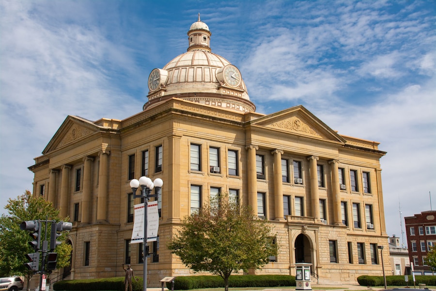A large, classical building with a prominent dome and columns.