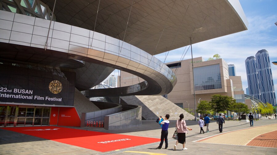 Busan Cinema Center featuring modern architecture as well as a couple