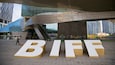 A modern building with large letters spelling "BIFI" on the ground.