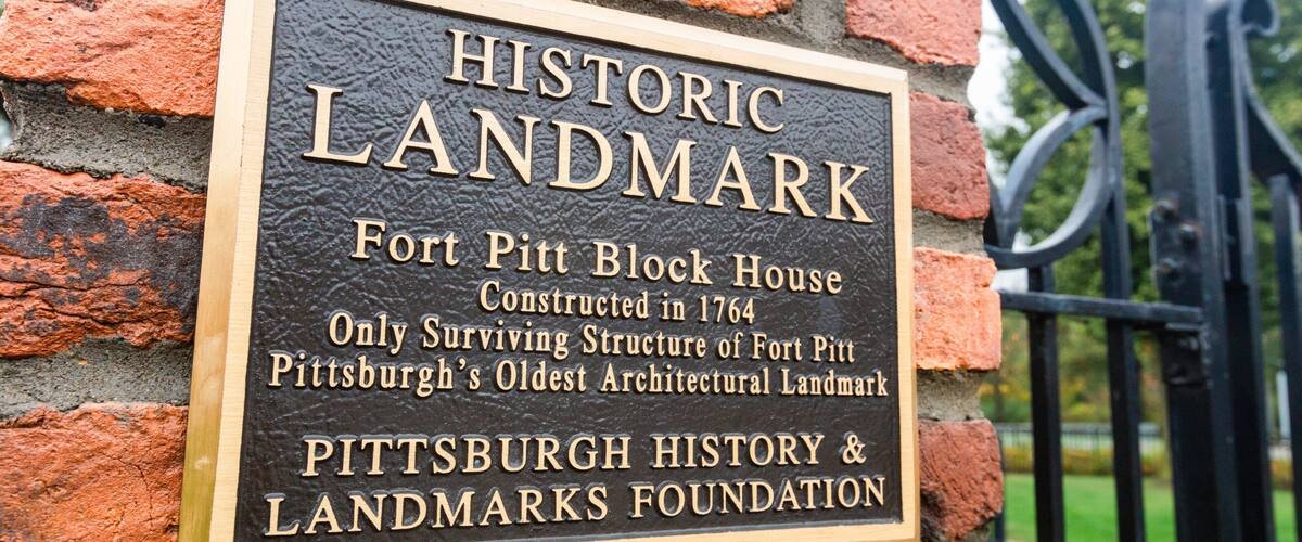 Fort Pitt Block House featuring signage and heritage elements