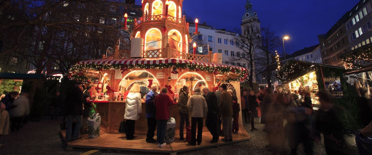 Rindermarkt showing night scenes and street scenes as well as a large group of people