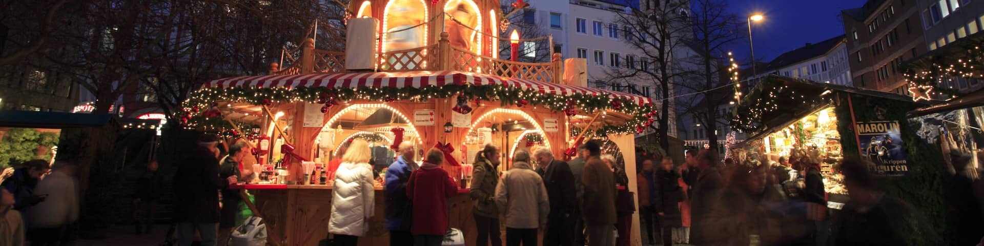 Rindermarkt showing night scenes and street scenes as well as a large group of people