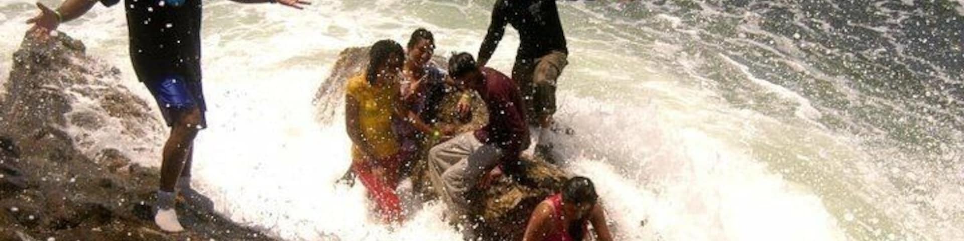 #EndlessSummer - the waves were "mamaguying" which is a trini slang that means "not for real" or "joking". This is as high as the tide swells and the height where we were on the shale rocks were just the level it reaches to sprinkle you. ❤️