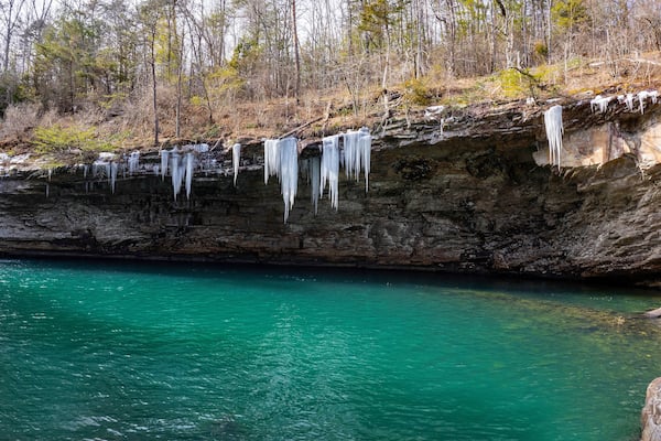 Lula Lake Land Trust, Lookout Mountain, Georgia. Icicles hang from the cliffs surrounding the beautiful aqua-blue water of Lula Lake, which is fed by Rock Creek.