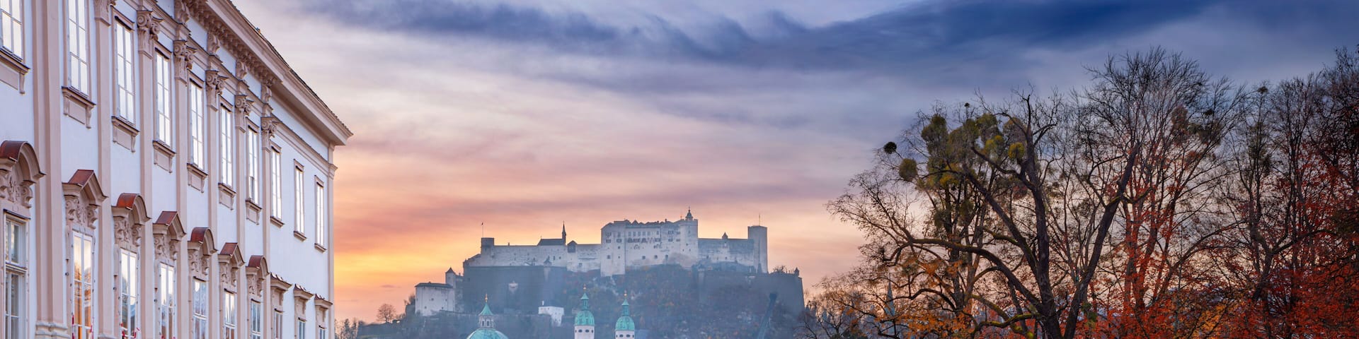 Salzburg, Austria. Cityscape image of the Salzburg, Austria with Mirabell Gardens during autumn sunrise.