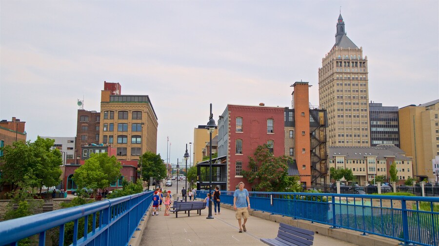 Pont de Rennes Bridge which includes a bridge and a city as well as a small group of people