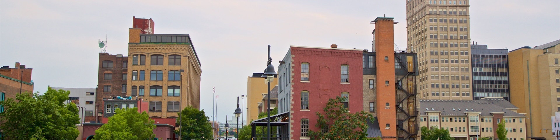 Pont de Rennes Bridge which includes a bridge and a city as well as a small group of people
