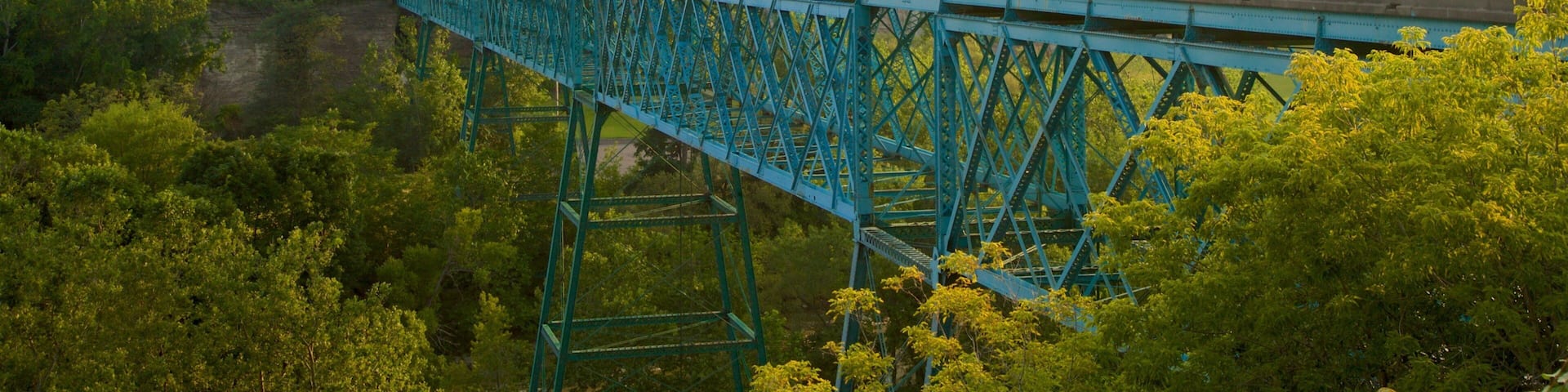 Pont de Rennes Bridge showing a city, a sunset and a bridge