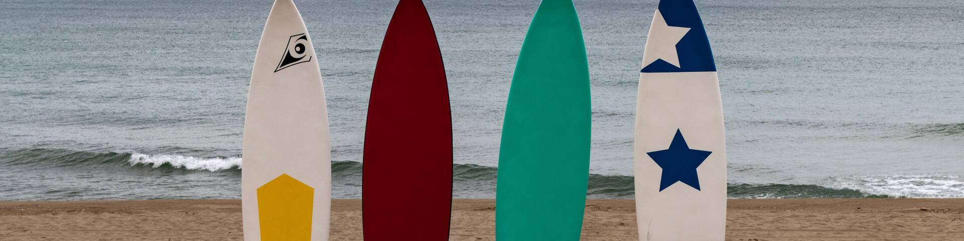 surfing boards on the beach