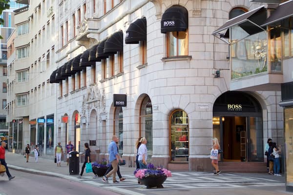 Norrmalm\'s Square showing a city, flowers and street scenes