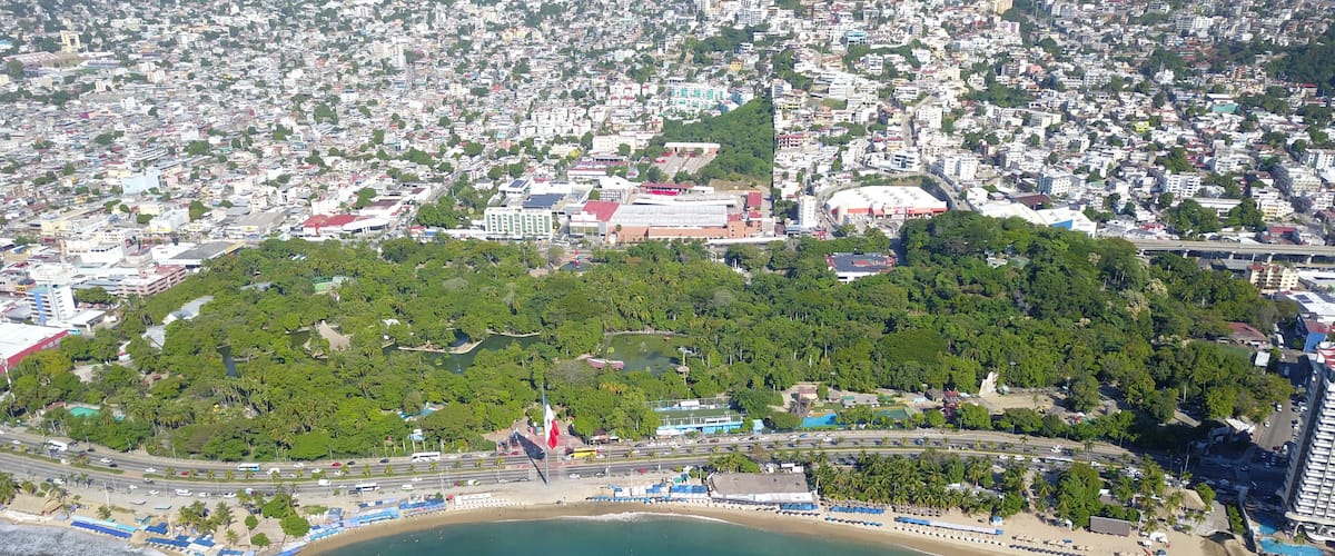 Wide view of Acapulco Bay from the sea taken with a drone