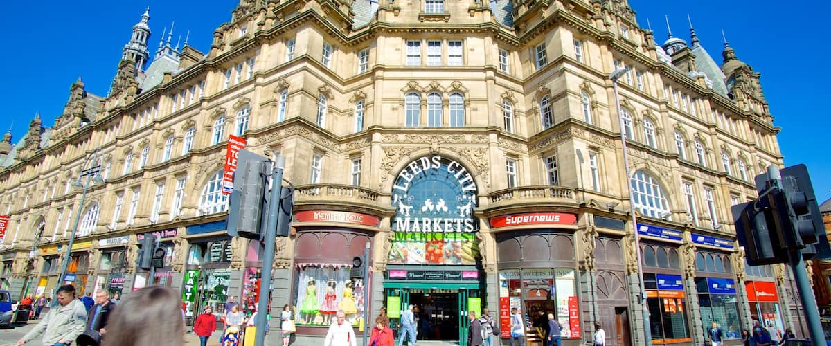 Leeds Kirkgate Market which includes heritage architecture as well as a large group of people