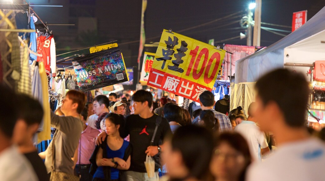 Tainan showing night scenes and markets as well as a large group of people