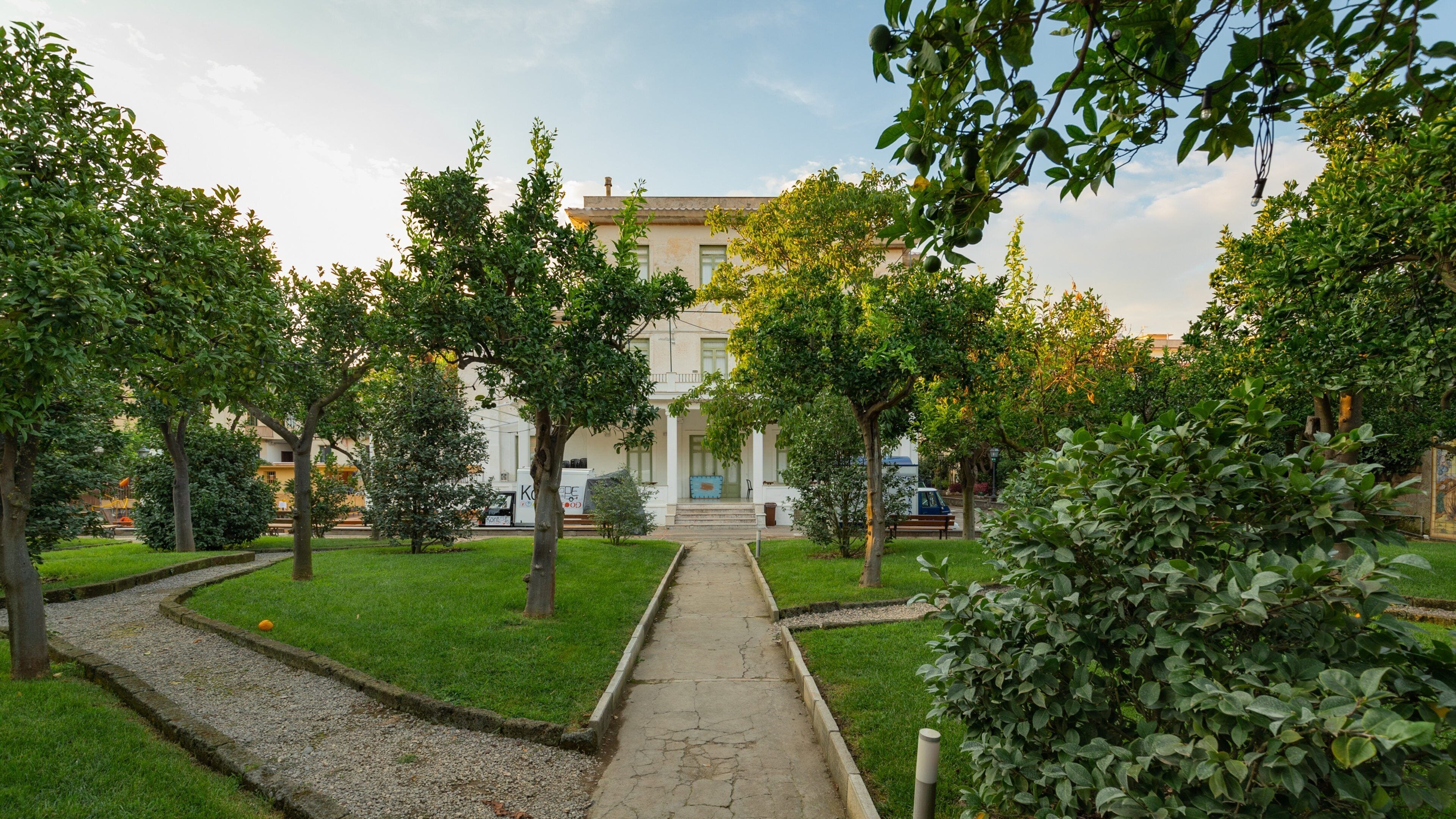 Sorrento Foundation featuring a sunset, a garden and a house