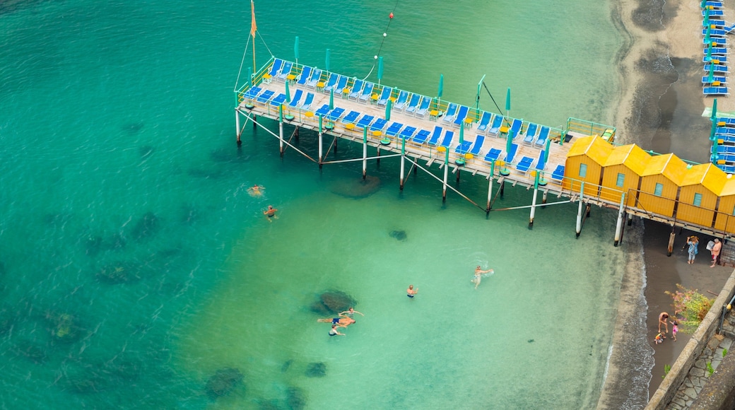 Sorrento Lift showing general coastal views and swimming as well as a small group of people