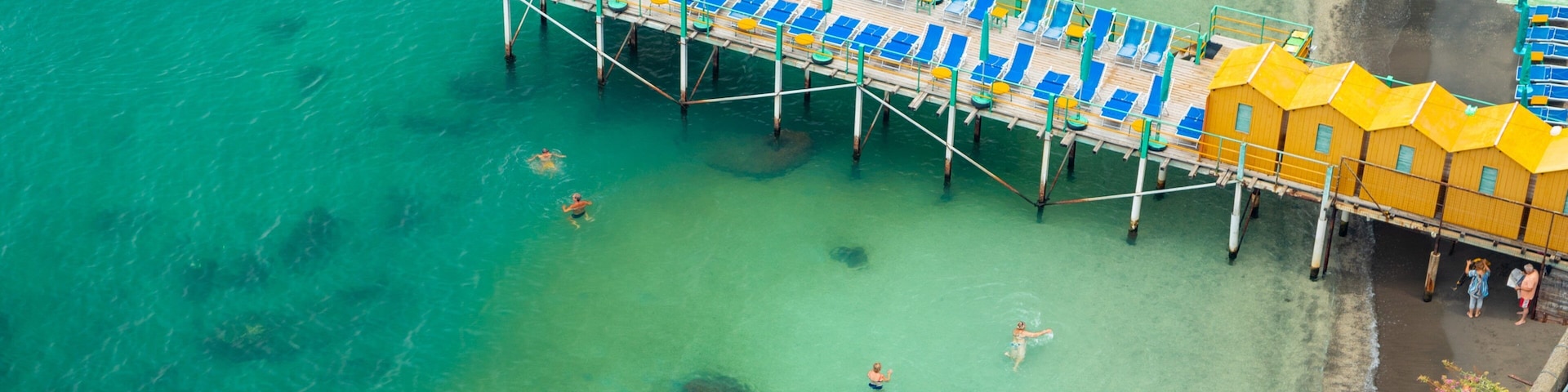 Sorrento Lift showing general coastal views and swimming as well as a small group of people