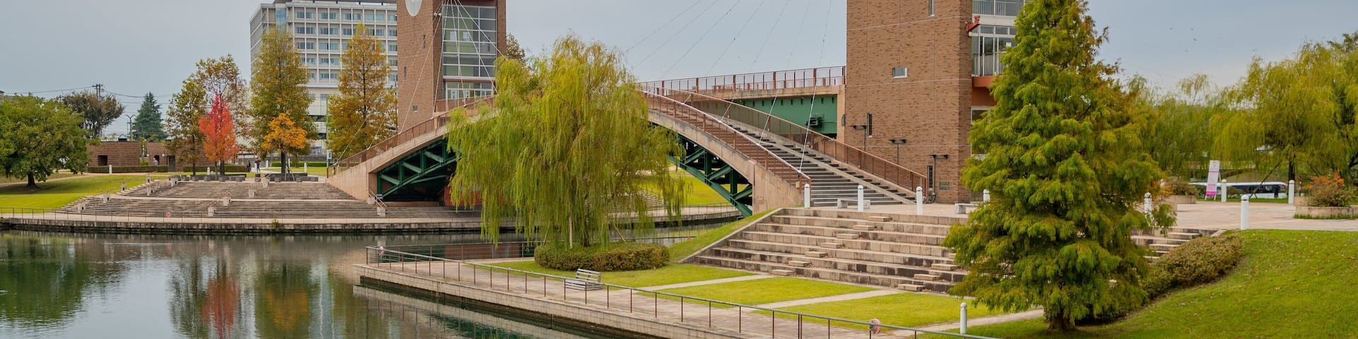 Tomi Canal Kansui Park which includes a park and a pond
